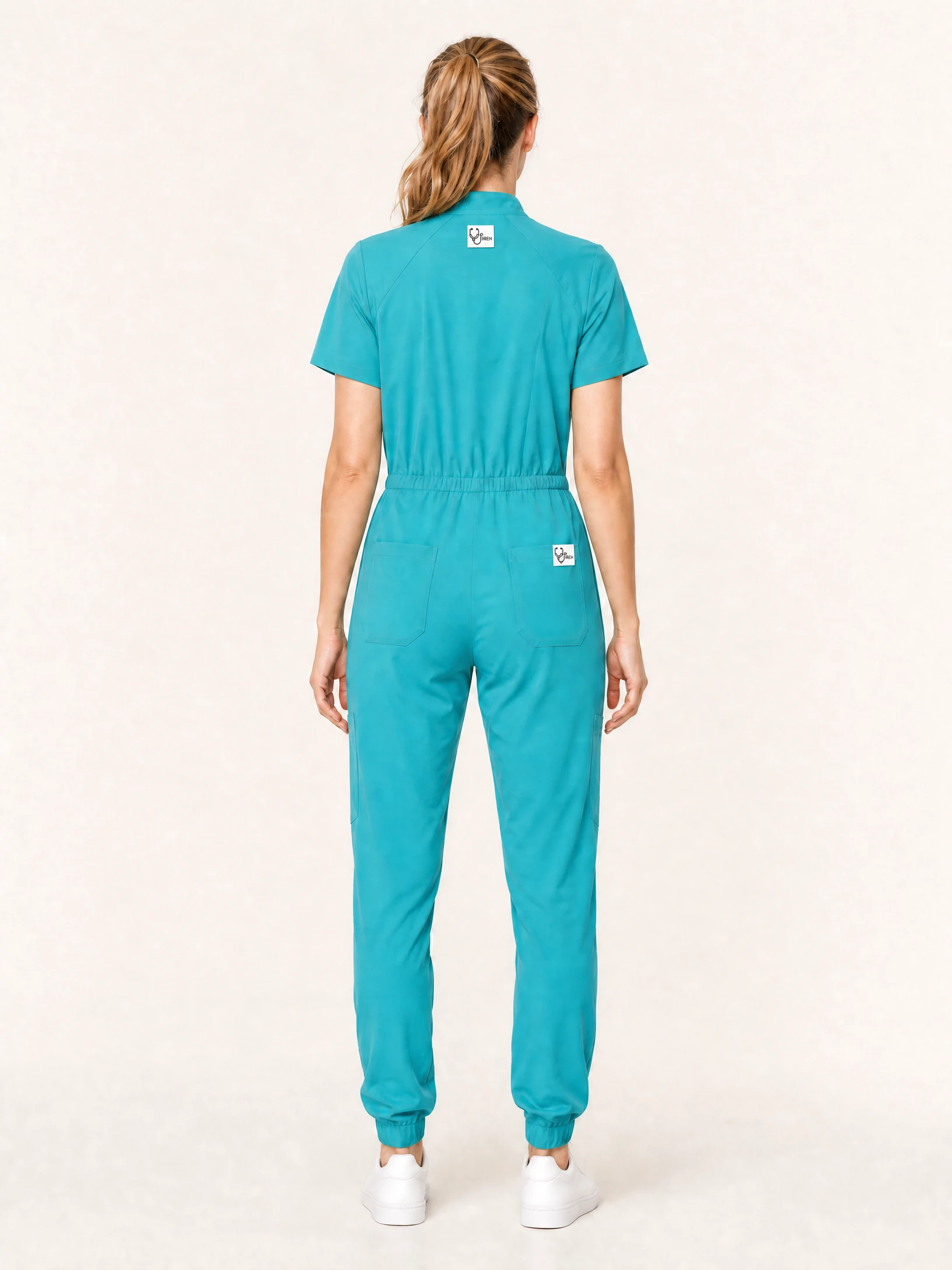 The Zip-Front Jumpsuit in Teal, back