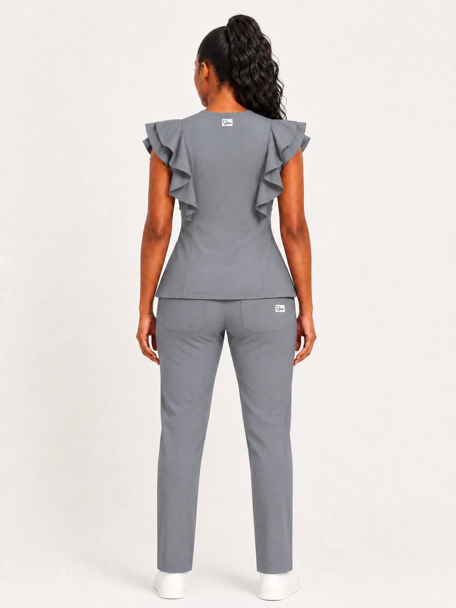 style3 grey swatch26 white back Back view of the Yireh Fashion Flare Scrub Set in Grey.