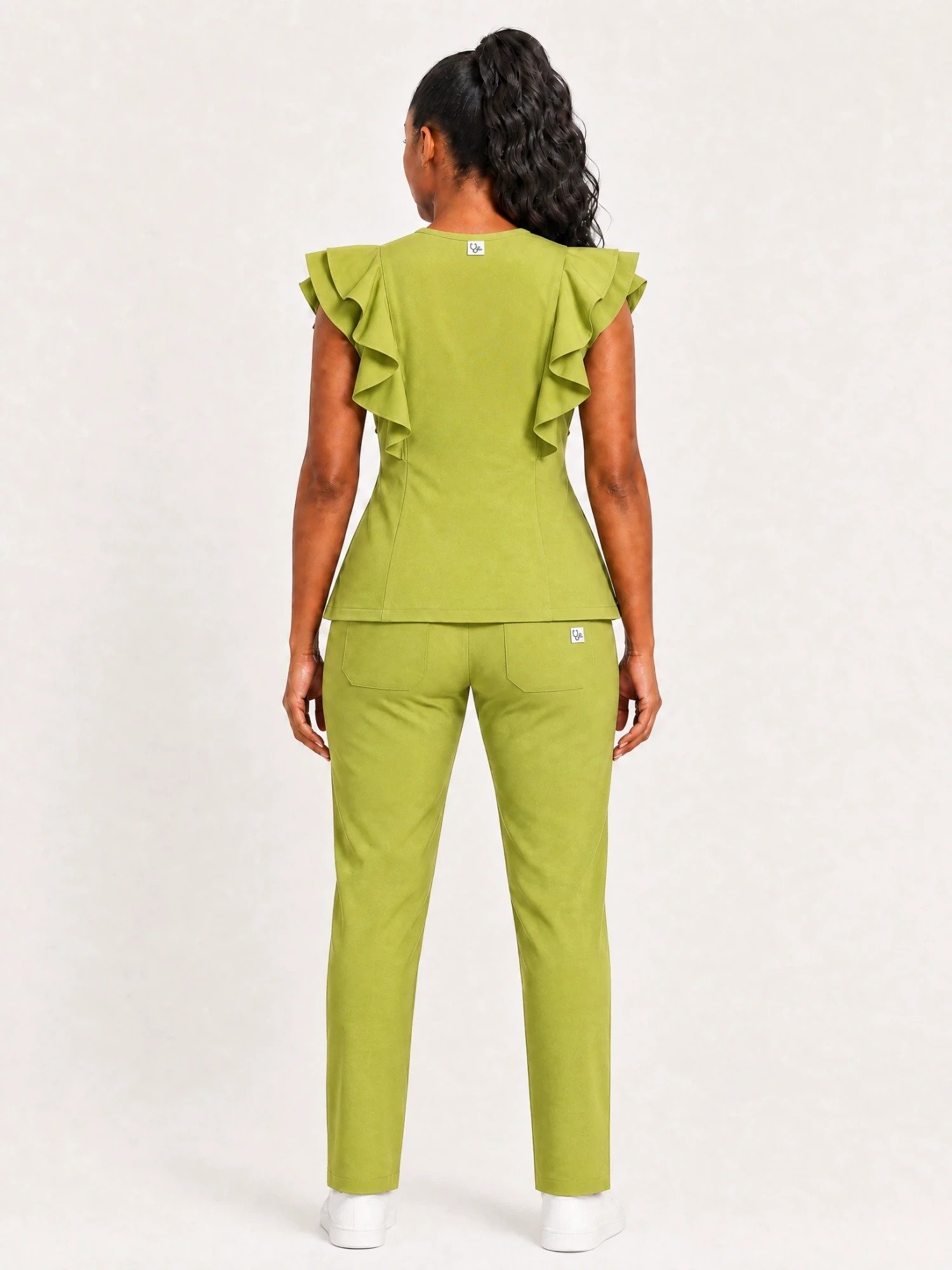 style3 lime olive swatch21 white back Back view of the Yireh Fashion Flare Scrub Set in Lime Olive.